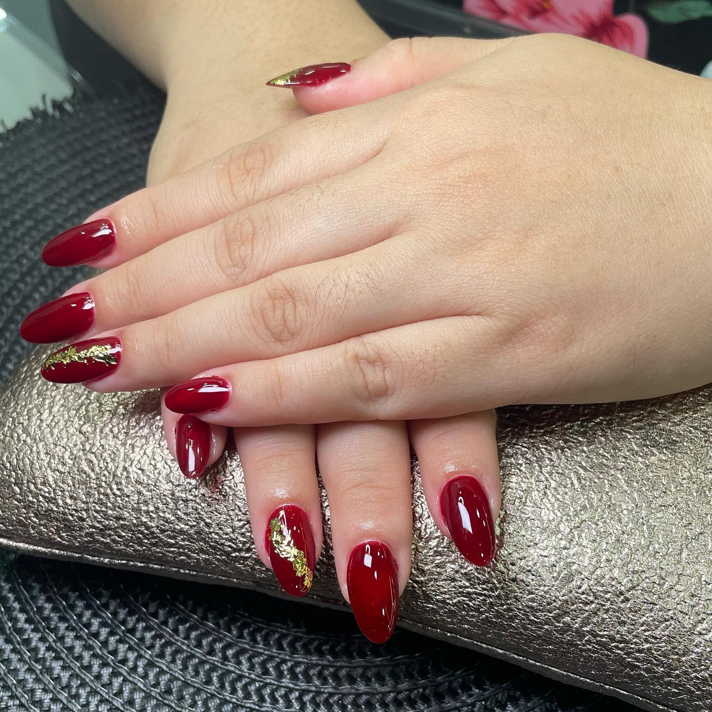 Sheer nails with delicate gold studs.
